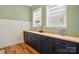 Charming butler's pantry with ample cabinet storage, wooden countertops, and accent wall paint at 1318 Encore Ln, Waxhaw, NC 28173