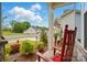 Charming front porch with rocking chairs and well-maintained landscaping at 1318 Encore Ln, Waxhaw, NC 28173