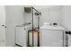 Well-equipped laundry room with modern washer and dryer units at 1318 Encore Ln, Waxhaw, NC 28173