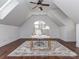 Bright office with hardwood floors, a desk, and a large window with a view at 1404 Lookout Cir, Waxhaw, NC 28173