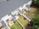 Aerial view of backyards features well-kept lawns, patios, and fences at 15042 Deshler Ct, Charlotte, NC 28273