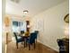 Cozy dining area featuring a round table, comfortable seating, and sliding door access at 15042 Deshler Ct, Charlotte, NC 28273