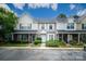 Charming townhome with a well-maintained lawn, inviting entrance, and convenient parking at 15042 Deshler Ct, Charlotte, NC 28273
