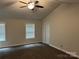 Spacious bedroom with neutral tones, ceiling fan, and natural light at 1521 Park Ave, Salisbury, NC 28146