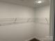 Walk-in closet featuring wire shelving and neutral walls at 1521 Park Ave, Salisbury, NC 28146