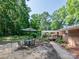 Beautiful backyard with a patio and a covered deck area, ideal for gatherings and outdoor enjoyment at 160 Eagle Dr, Salisbury, NC 28144
