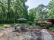 Well-maintained backyard, featuring a patio seating area and an open lawn at 160 Eagle Dr, Salisbury, NC 28144