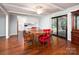 Dining area featuring wood table and chairs, with views into the kitchen and deck at 160 Eagle Dr, Salisbury, NC 28144