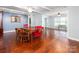 Spacious dining area with wood floors, stylish furniture, and abundant natural light at 160 Eagle Dr, Salisbury, NC 28144