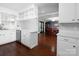 Kitchen boasts white cabinets, updated appliances and flows into dining area at 160 Eagle Dr, Salisbury, NC 28144