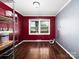 Bright laundry room features hardwood floors, fresh paint, a window for natural light, and plenty of storage space at 160 Eagle Dr, Salisbury, NC 28144