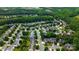An aerial view of a residential community, showcasing its layout and surrounding greenery at 16012 Caranna Ct, Charlotte, NC 28277