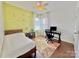 Comfortable bedroom features hardwood flooring, accent wall art and natural light from bay windows at 16012 Caranna Ct, Charlotte, NC 28277