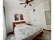 Comfortable bedroom with a ceiling fan, painting, and closet at 16012 Caranna Ct, Charlotte, NC 28277