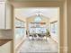 Charming dining room filled with natural light, perfect for Gathering meals and elegant entertaining at 16012 Caranna Ct, Charlotte, NC 28277