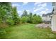 Expansive backyard with a concrete patio and lush lawn, ideal for outdoor activities at 170 Glenn Allen Rd, Mooresville, NC 28115