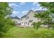 Spacious backyard with a concrete patio and a view of the home's exterior at 170 Glenn Allen Rd, Mooresville, NC 28115