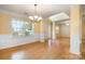 Formal dining room with natural light and elegant chandelier at 170 Glenn Allen Rd, Mooresville, NC 28115