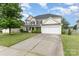 Charming two-story home featuring a well-manicured lawn, a two-car garage, and a classic facade at 170 Glenn Allen Rd, Mooresville, NC 28115