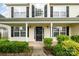 The front of the house features a well-manicured lawn and carefully trimmed shrubs at 170 Glenn Allen Rd, Mooresville, NC 28115