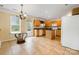 Bright and spacious kitchen with tile floor, table, and door to backyard at 170 Glenn Allen Rd, Mooresville, NC 28115