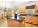 Kitchen featuring an island, dark countertops and light cabinets at 170 Glenn Allen Rd, Mooresville, NC 28115