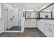 Luxurious bathroom featuring a glass shower, dual mirrors, and a spacious vanity at 1905 Tranquility Blvd, Lancaster, SC 29720