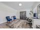 Bright home office with hardwood floors, elegant furniture, and ample natural light at 1905 Tranquility Blvd, Lancaster, SC 29720