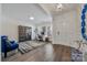 Well-lit office space featuring hardwood floors, sophisticated decor, and a functional layout at 1905 Tranquility Blvd, Lancaster, SC 29720