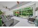 Bright sunroom featuring large sliding glass doors and comfortable seating at 1905 Tranquility Blvd, Lancaster, SC 29720