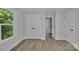 Bedroom with large closet, natural light and hardwood flooring at 1935 St Mark St, Charlotte, NC 28216