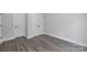 Bedroom with modern hardwood flooring and plenty of closet space at 1935 St Mark St, Charlotte, NC 28216