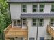 Back exterior with a wood deck and a view of the surrounding landscape at 1935 St Mark St, Charlotte, NC 28216