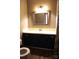 This bathroom features an undermount sink, dark cabinets, and neutral paint at 1958 19Th Avenue Ne Dr # 8, Hickory, NC 28601