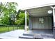 Large gray deck with railing overlooks the verdant yard, offering space for relaxation at 1958 19Th Avenue Ne Dr # 8, Hickory, NC 28601