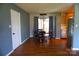 Cozy dining room with backyard access, featuring hardwood floors and stylish lighting at 1958 19Th Avenue Ne Dr # 8, Hickory, NC 28601