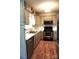 Modern kitchen equipped with stainless steel appliances, stylish cabinetry, and hardwood floors at 1958 19Th Avenue Ne Dr # 8, Hickory, NC 28601