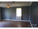 Cozy living room features wood-look floors, neutral walls, and bright natural light at 1958 19Th Avenue Ne Dr # 8, Hickory, NC 28601