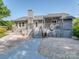 Backyard featuring a spacious deck and outdoor seating at 214 Wilcrest Dr, Matthews, NC 28105