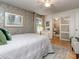 Bright bedroom with en-suite bathroom access with a large window and hardwood floors at 214 Wilcrest Dr, Matthews, NC 28105