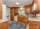 Cozy kitchen with stainless steel appliances, custom cabinetry, and a window view at 214 Wilcrest Dr, Matthews, NC 28105