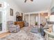 Spacious living room with vaulted ceilings, hardwood floors, neutral colors, and cozy furnishings at 214 Wilcrest Dr, Matthews, NC 28105