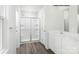 Modern bathroom with glass-enclosed shower and single sink vanity with plenty of storage at 217 Basildon St # 1018, Lancaster, SC 29720