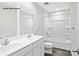 Clean bathroom features a dual sink vanity, large mirror, and shower-tub combination at 217 Basildon St # 1018, Lancaster, SC 29720