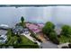 Aerial view of a waterfront home under construction with lake views at 22554 John Gamble Rd, Cornelius, NC 28031