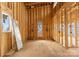 Unfinished Primary bathroom with exposed framing at 22554 John Gamble Rd, Cornelius, NC 28031