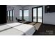 Serene main bedroom with floor-to-ceiling windows, a lake view, and stylish modern furniture at 22554 John Gamble Rd, Cornelius, NC 28031