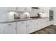 Modern kitchen with granite countertops, white subway tile backsplash, and stainless steel appliances at 2364 Delaney Dr, Fort Mill, SC 29715