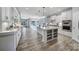 Spacious kitchen boasts an open layout, large center island, stainless steel appliances, and ample cabinet space at 2364 Delaney Dr, Fort Mill, SC 29715