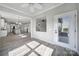 Open living area with view to the kitchen and a door leading to the outdoor area at 2364 Delaney Dr, Fort Mill, SC 29715